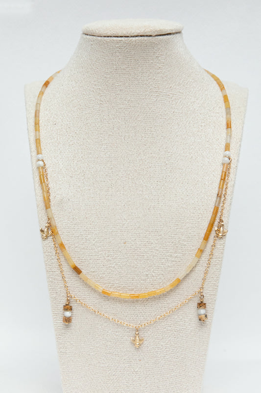 Handcrafted necklace with yellow aventurine, natural picture jasper gemstones and mother of pearl. It contains gold-filled elements and lovely bee charms. This jewellery is reminiscent to the beekeeping in Provence and is honey coloured. 